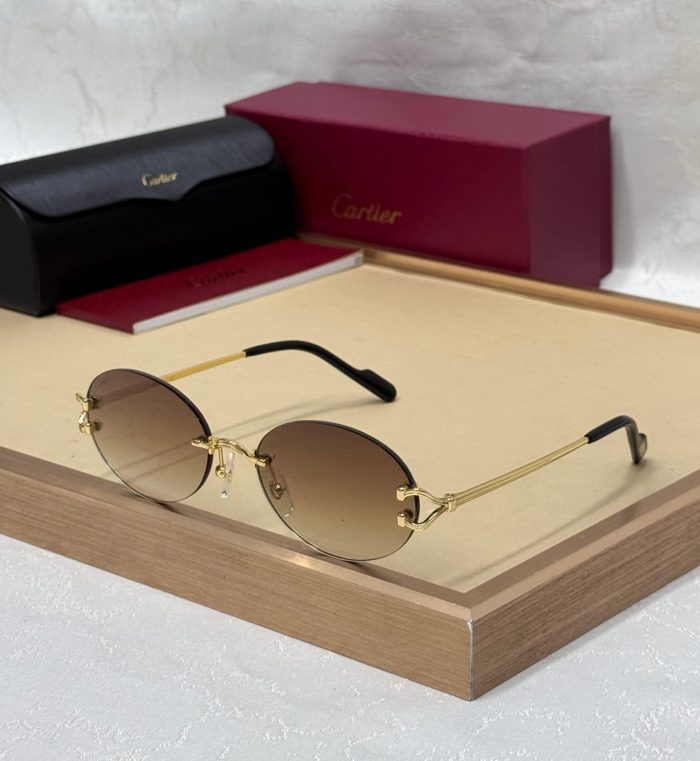 Cartier CT0551S Signature C de Cartier Oval Sunglasses With Gold-Finish Metal Frames And Brown Lenses
