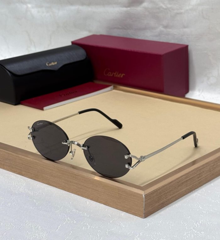 Cartier CT0551S Signature C de Cartier Oval Sunglasses With Sliver-Finish Metal Frames And Grey Lenses