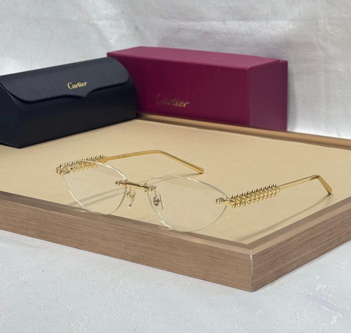 Cartier CT0565O Clash  Rimless Eyeglasses With  Golden Finish And Cat-Eye Shape