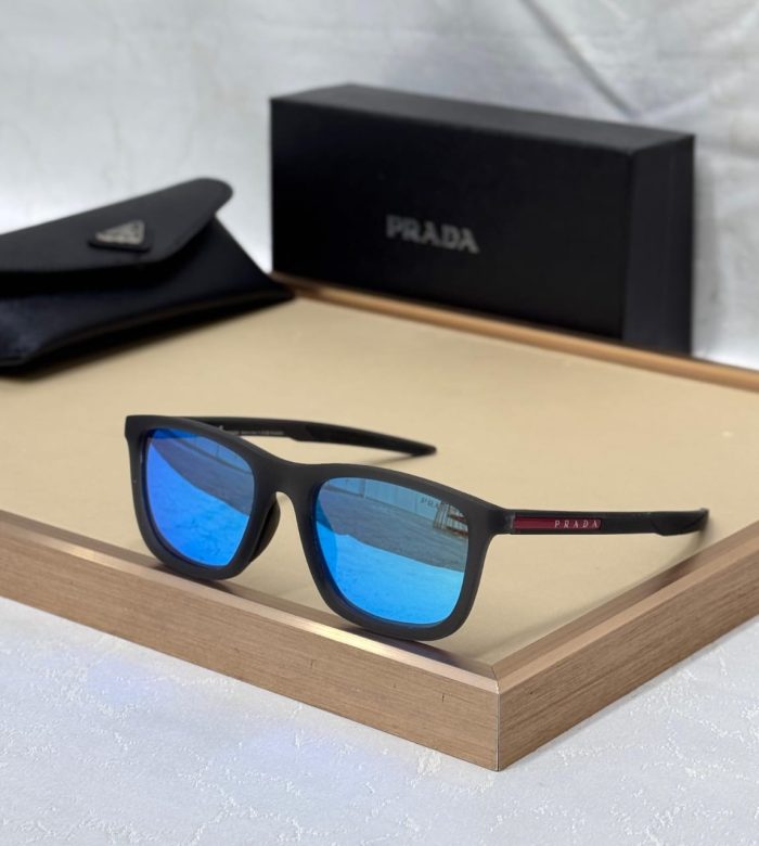 Prada Linea Rossa PS 10WS Sunglasses In Black Rubber With Light Green Blue lense