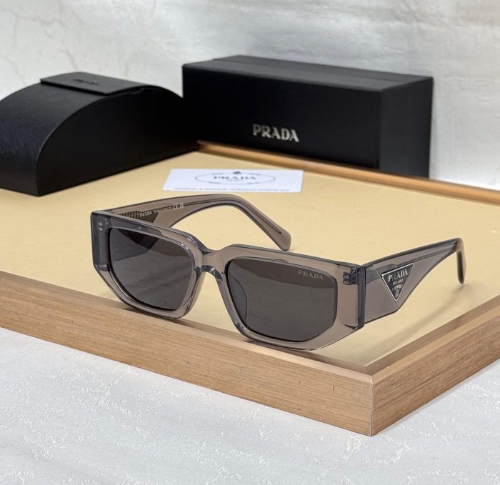 Prada PR 09ZS Symbole Sunglasses In Transparent Asphalt Acetate With Dark Gray Lenses