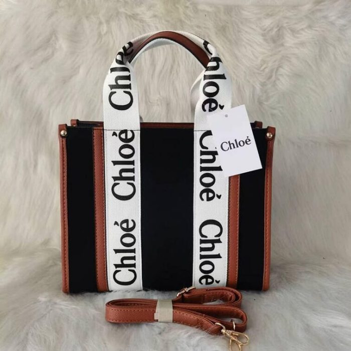Chloé Woody tote bag in black canvas and leather with logo-print web straps
