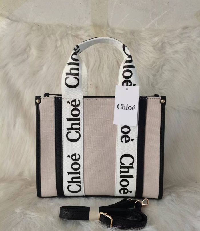 Chloé Small Woody Tote Bag in beige linen canvas with black leather trim and logo-print straps