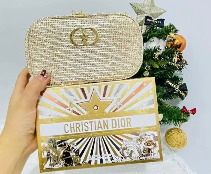 Dior 2025 Holiday Limited Edition gold sparkling cosmetic pouch with a handle