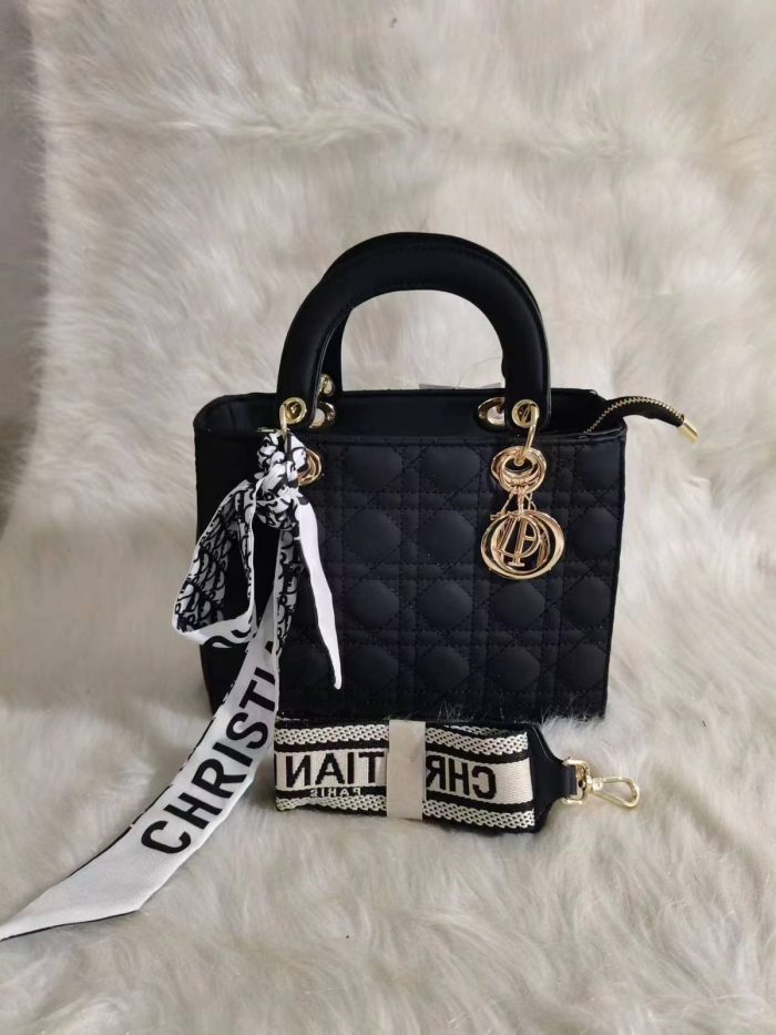 Dior Lady Dior bag in a Black color with cannage quilting and gold-finish metal D.I.O.R. charms