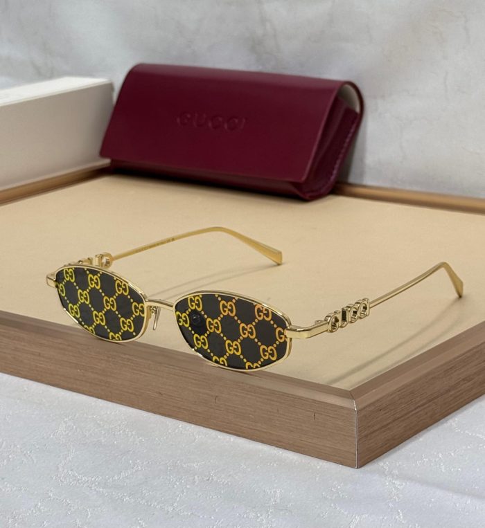 Gucci GG1802S Oval-Frame Sunglasses In Gold-Toned Metal Frame With Guccissima Logo Lenses