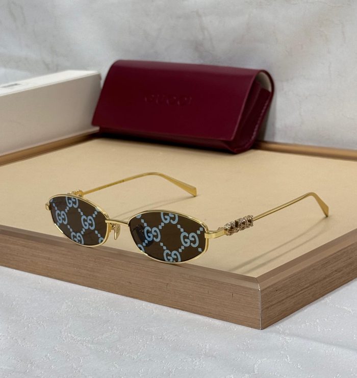Gucci GG1802S Oval-Frame Sunglasses In Gold-Toned Metal Frame With Guccissima Logo Lenses