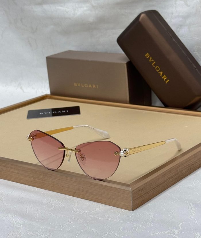 Bvlgari Pair Of Rimless Sunglasses, Potentially Model BV50042U  With Pink Lenses