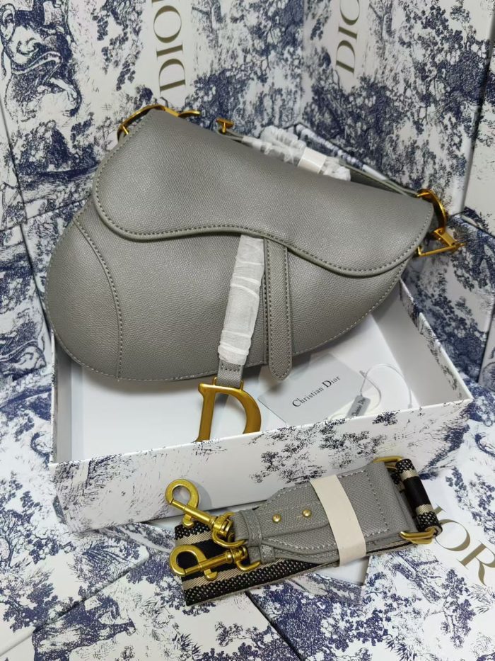 Christian Dior Saddle Bag in grey grained calfskin leather with a matching strap and antique gold-finish metal