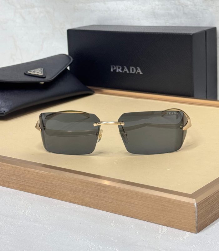 Prada PR A56S Rectangle-Frame Sunglasses In Satin Yellow Gold-Tone Metal With Dark Gray lenses