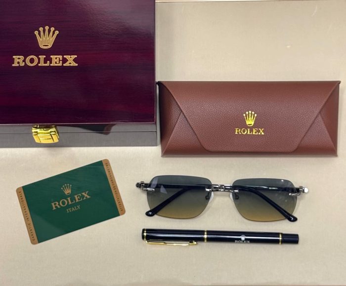 Rolex SS1229 Rimless Sunglasses With A Gold-Colored Metal Frame With Dark Black Lens