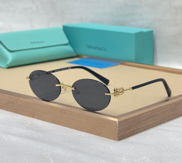 Tiffany & Co. TF 3104D Unisex Oval Sunglasses With  Gold Metal Frame And  Black Lenses